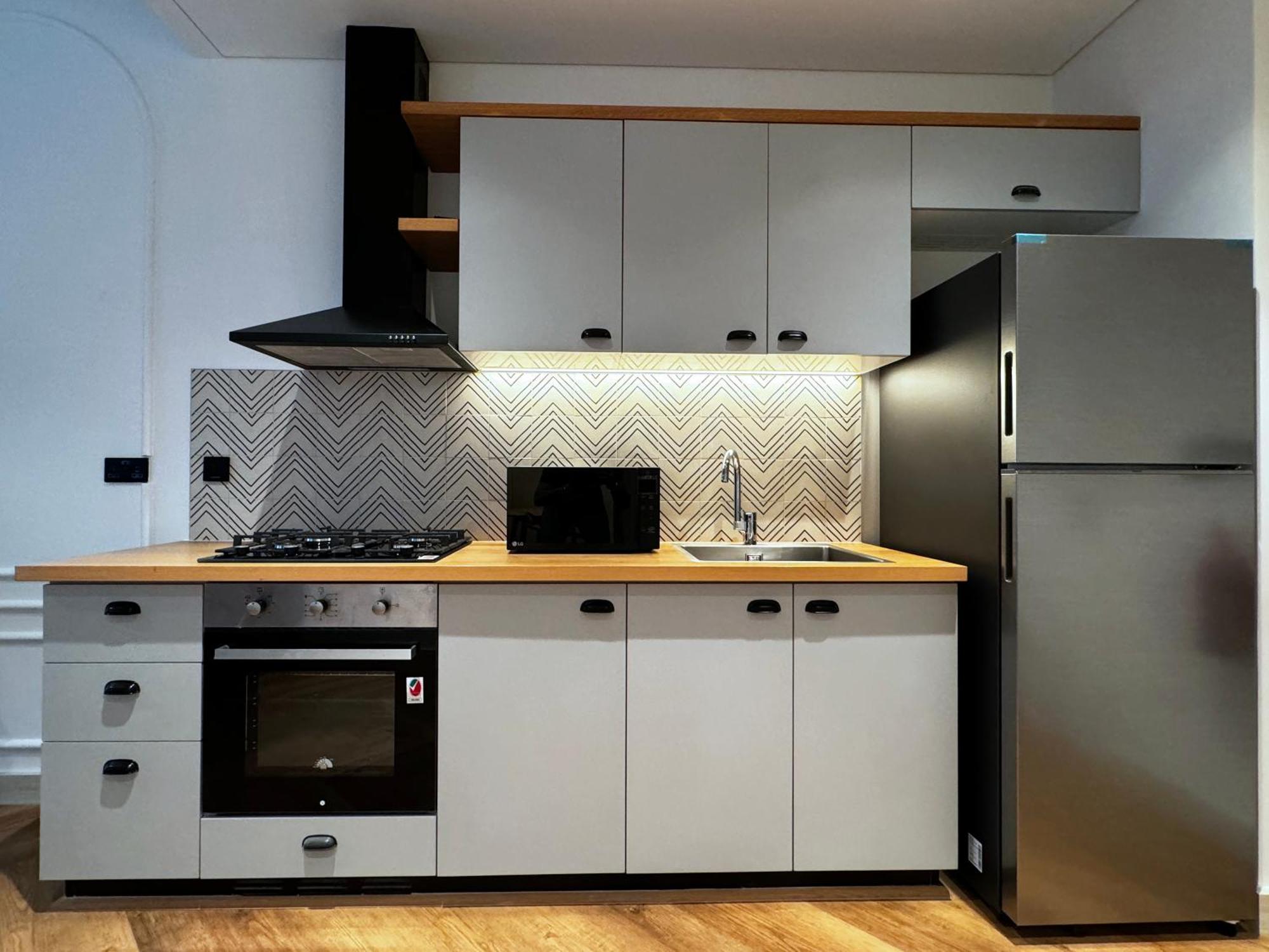 Elite Escapes - Socio Stylish 1 Bhk Getaway Apartment