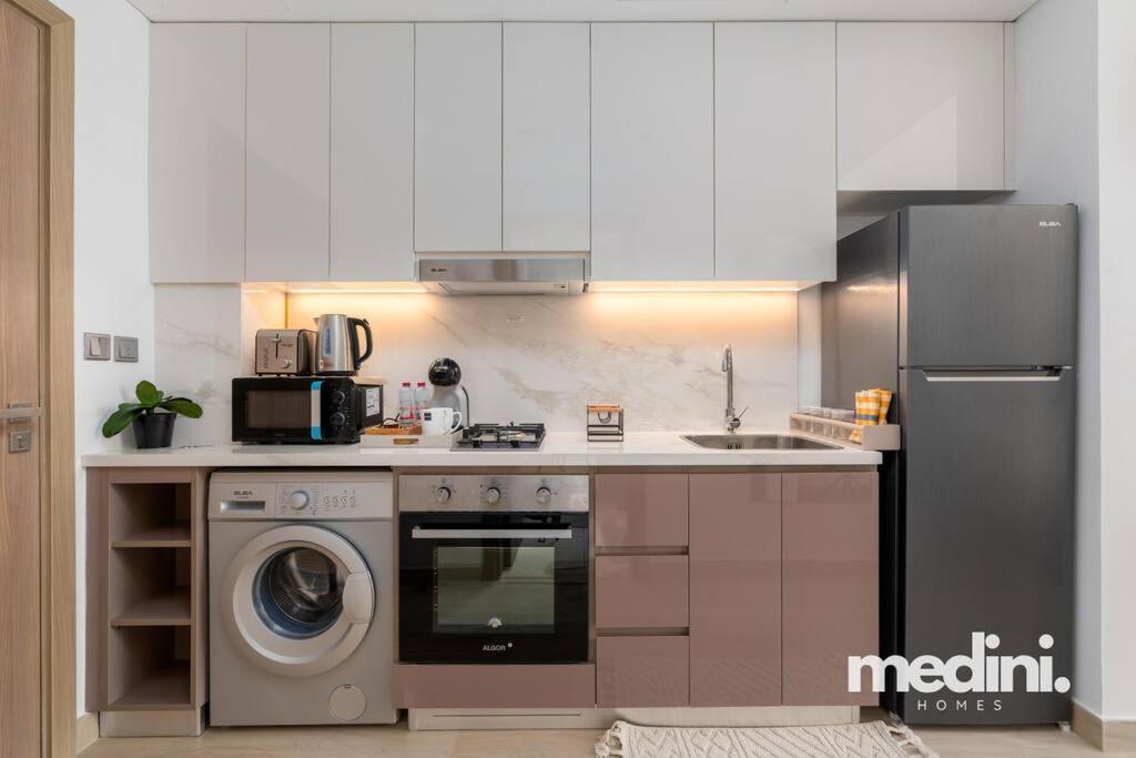 - Azizi Riviera 37 Apartment