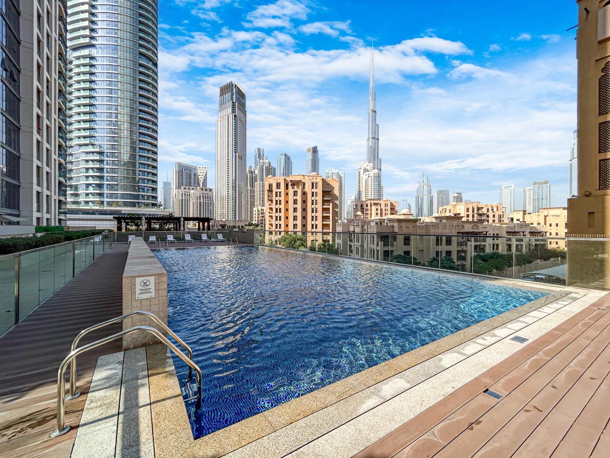 Family In Downtown Overlooking Burj Khalifa