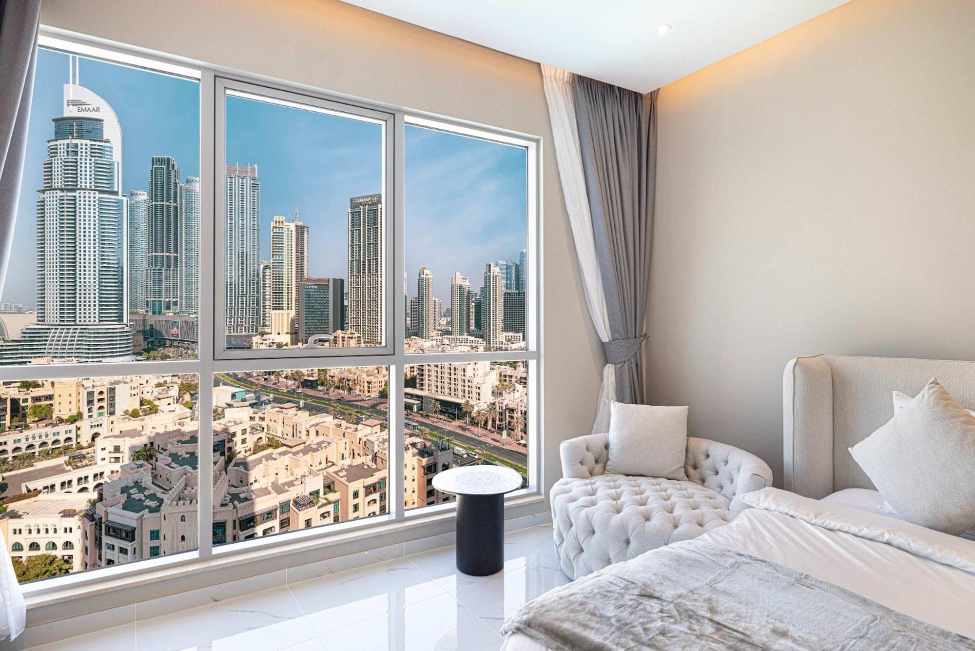 Downtown Sanctuary Iconic Burj Views & Luxury Living *