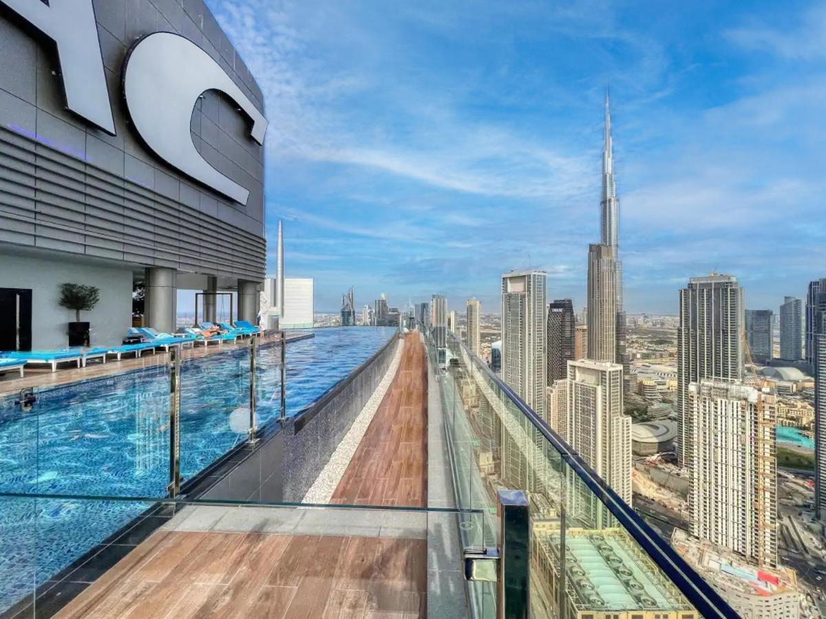 Stunning Burj View - High Infinity Pool - Cozy 2br Apartment *