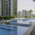 Elegant Apartment Amidst Vibrant Area With Balcony