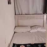 Couples Room With Window Smart Tv Fridge
