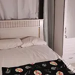 Couples Room With Window Smart Tv Fridge