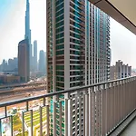 Burj Khalifa View With Grass Turf Balcony-Downtown By Tanami Holiday Homes