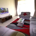 Druvya Holiday Homes, Bld Dg022, Street No,2 Discovery Gardens, Close To The Gardens Metro 3 Minutes Walkable