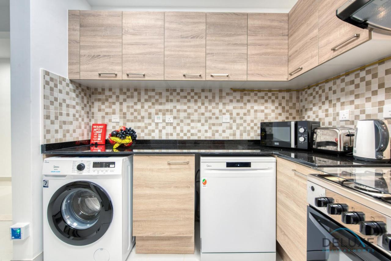 Vivid 2br At Canal Residences West Sports By Deluxe Homes Dubai