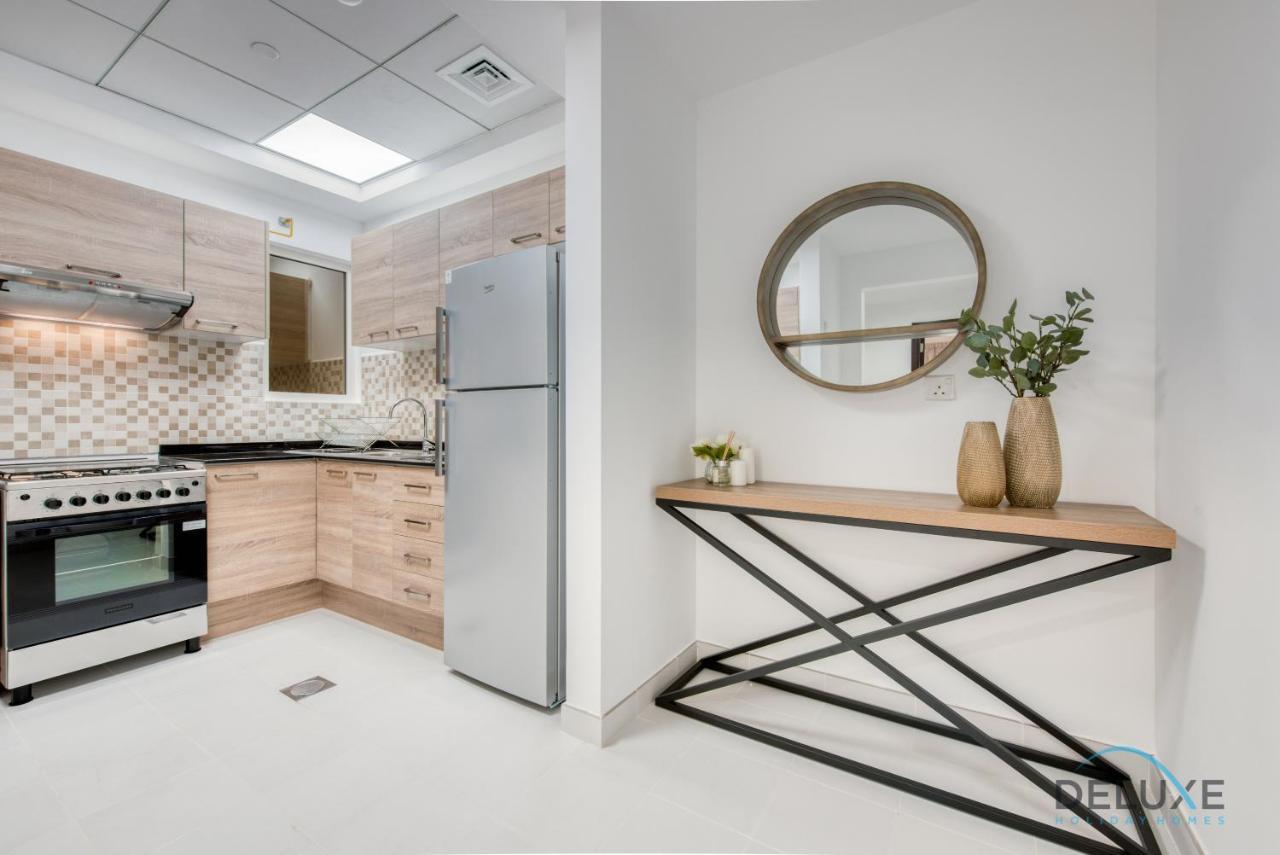 Vivid 2br At Canal Residences West Sports By Deluxe Homes Dubai