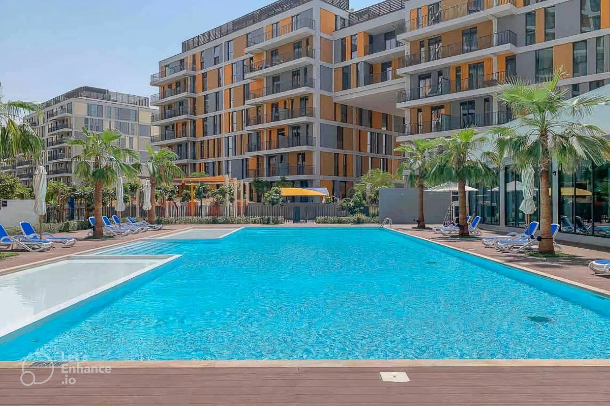 Modern 1-bedroom In Family-friendly With Swimming Pool, Gym & Free Parking.