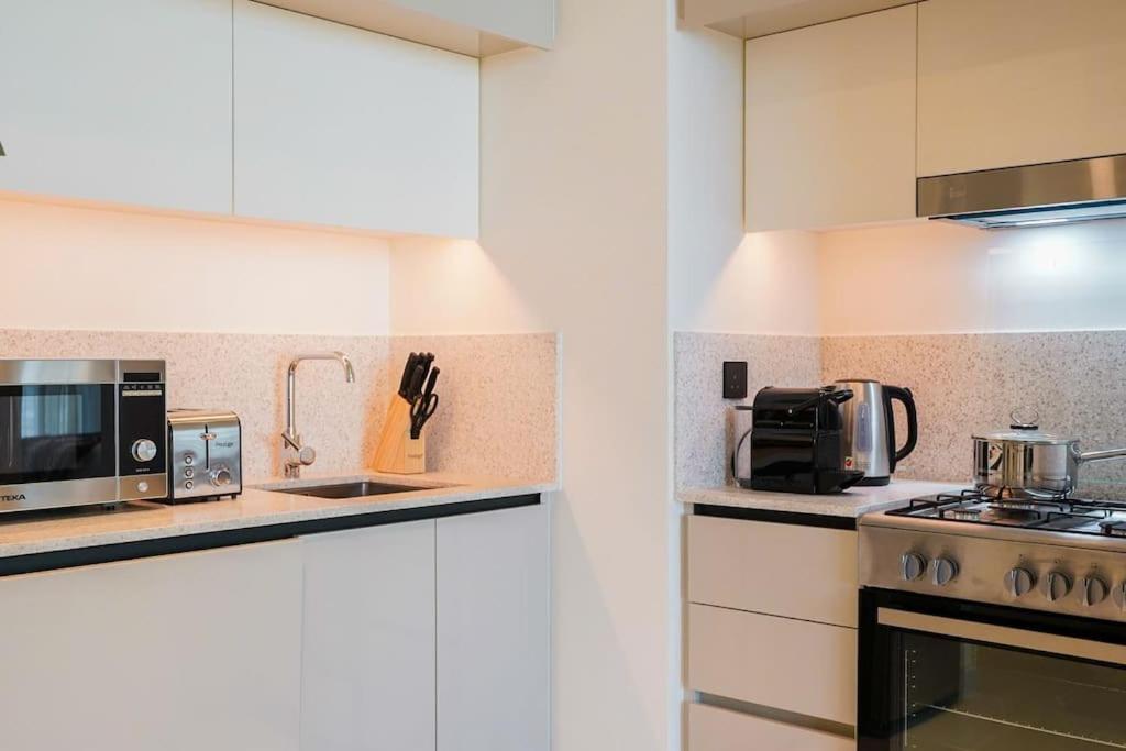 Beachfront Bliss - With Pool And Premium Amenities Apartment