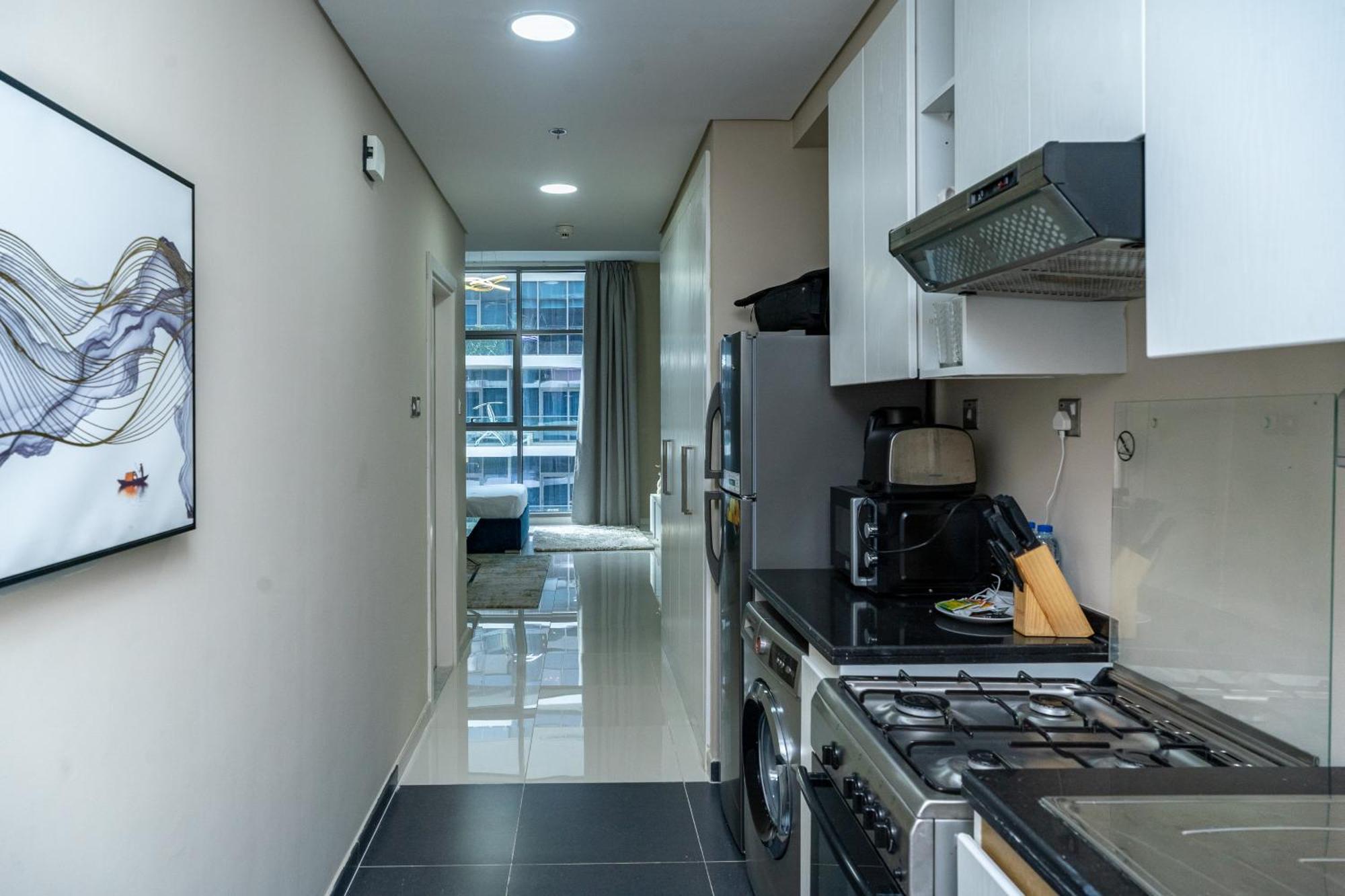 Escape24 Beautiful In Loreto Damac Hills Apartment Dubai
