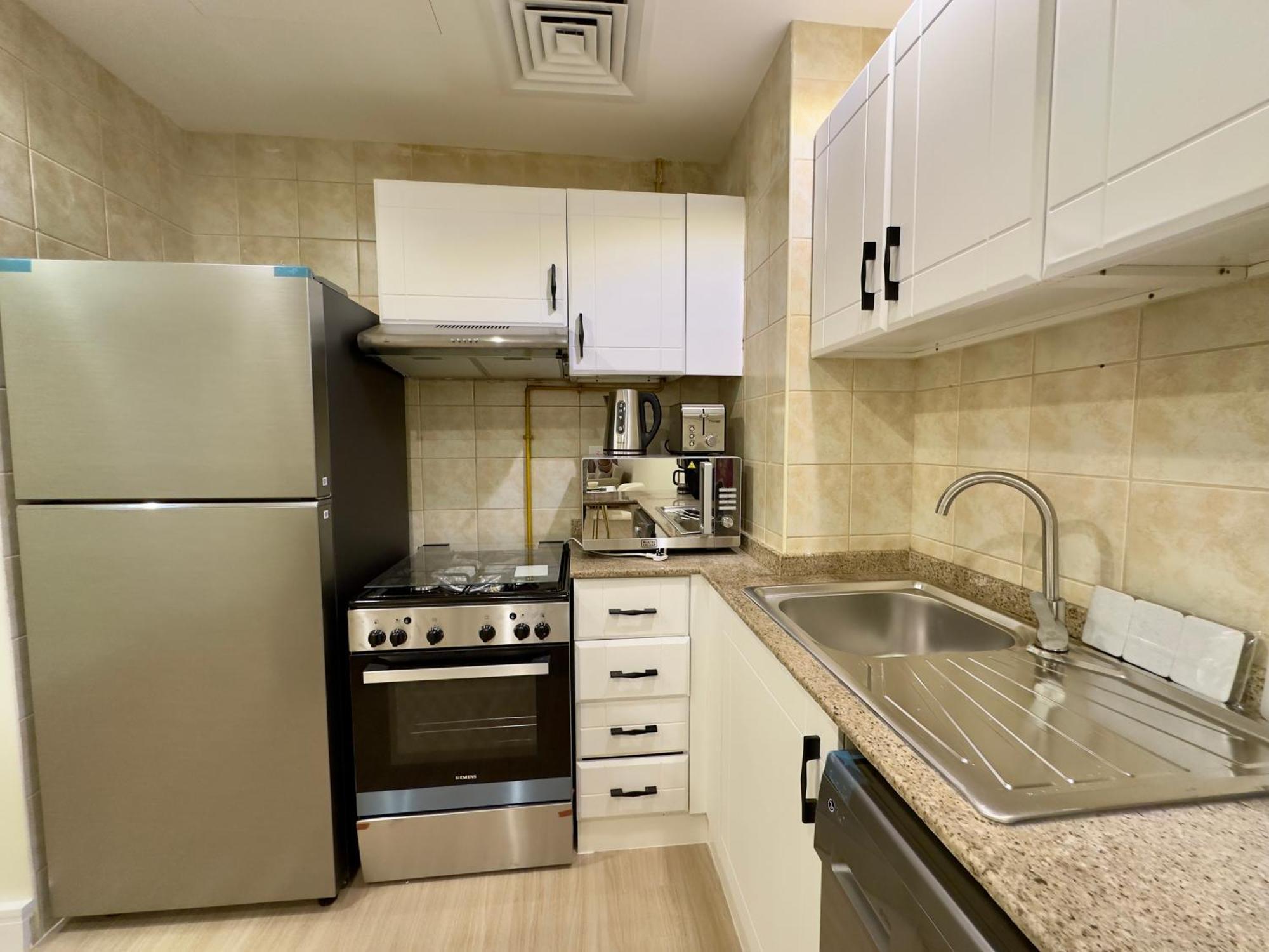 Jvc Emirates Garden Quickstay Homes 32 Apartment Dubai