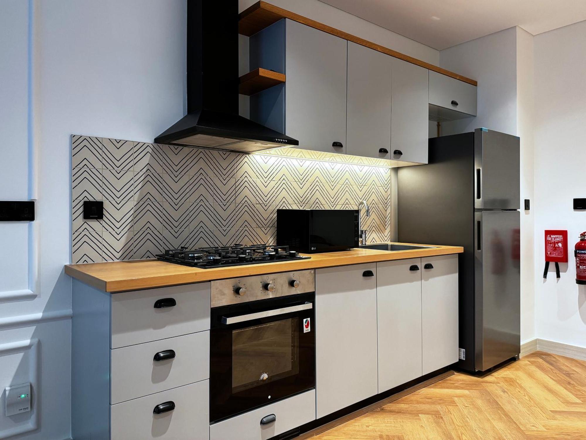 Elite Escapes - Socio Stylish 1 Bhk Getaway