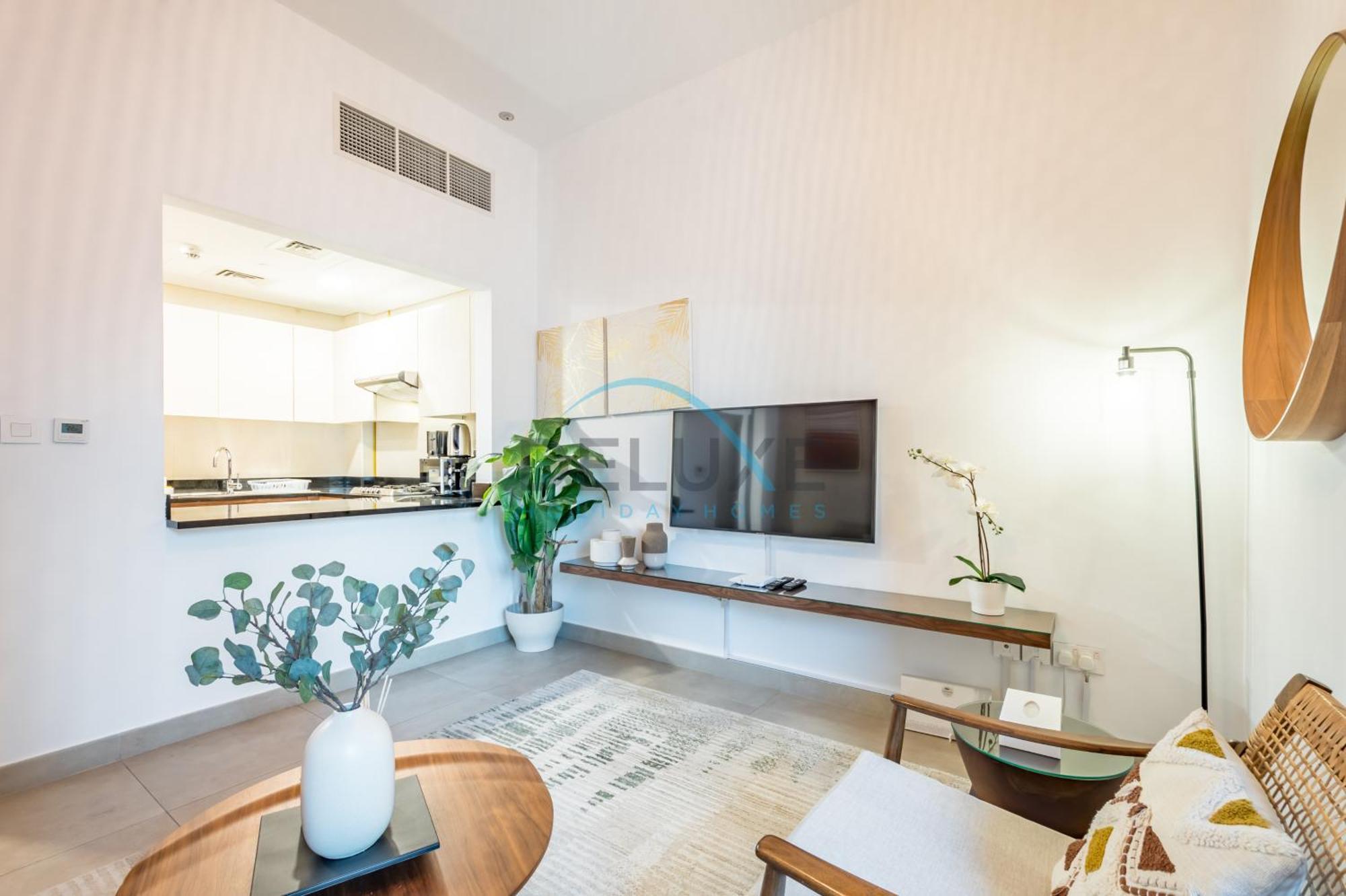Cozy 1br Getaway In Sparkle Tower 3, Marina Buy Deluxe Homes