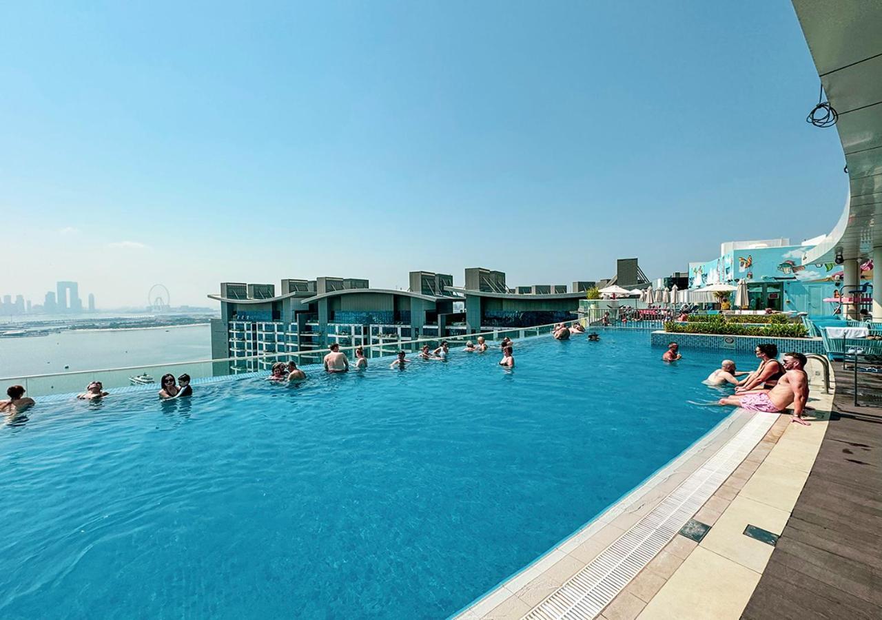 Palm Jumeirah - Free Infinity Pool & Private Beach Apartment Dubai