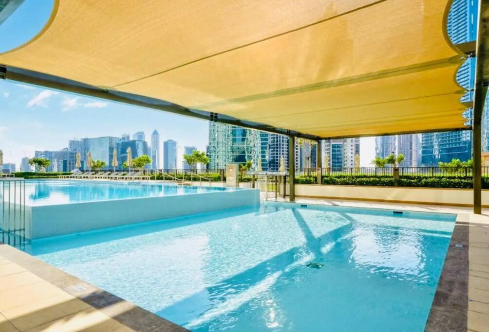 Apartment Modern High Rise 2br With Burj Khalifa Views, Steps From Opera And Near Mall Dubai