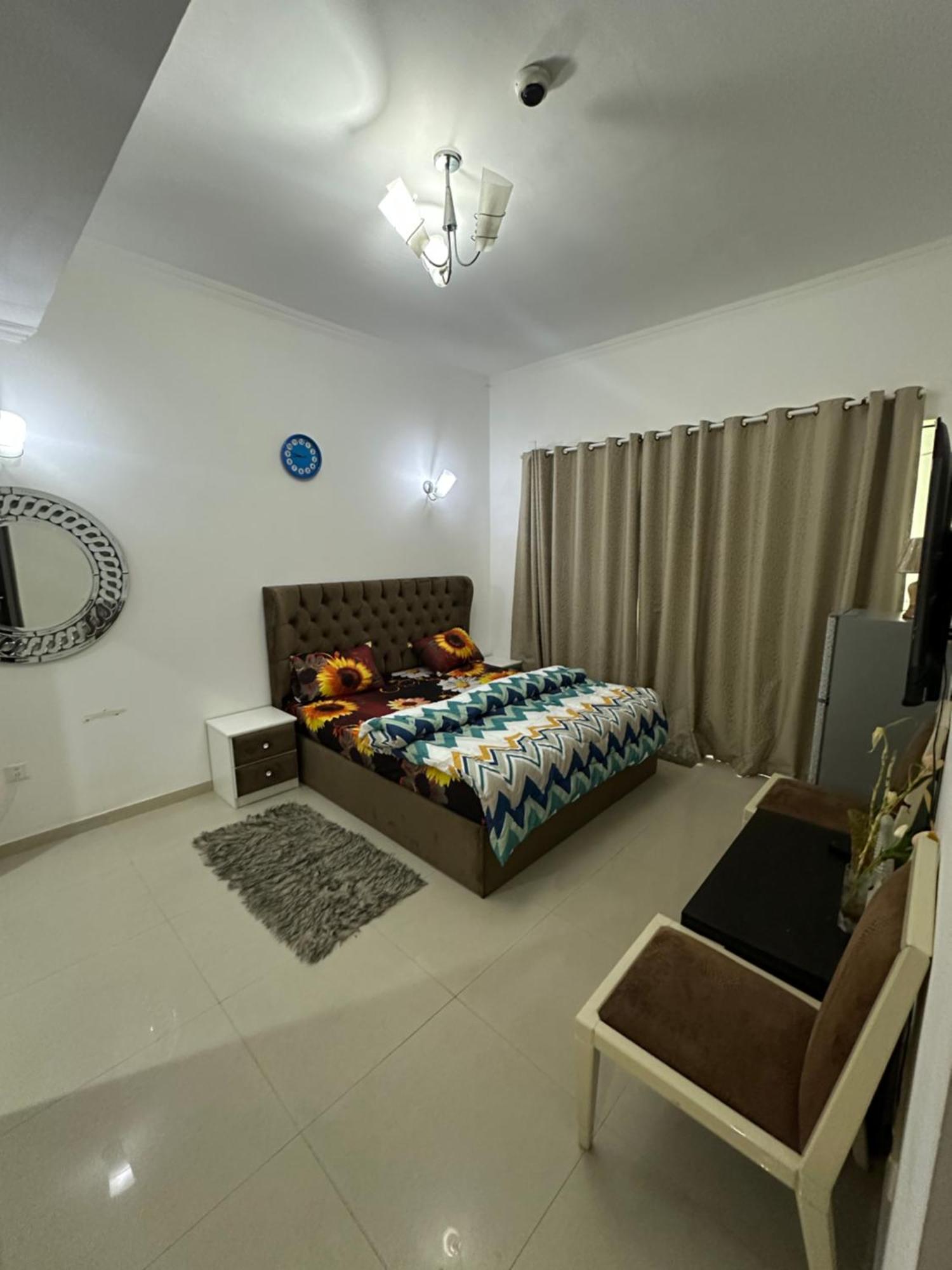 Bedroom With Attach Bath And Balcony In Marina Homestay