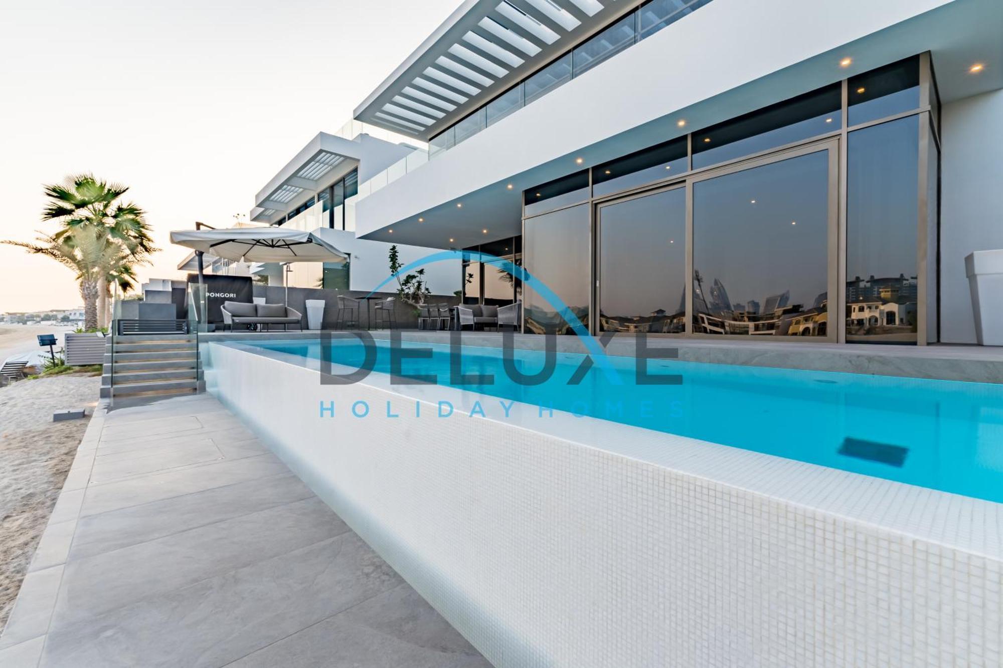 Elegant 6br Beachfront With Rooftop And Own Pool By Deluxe Homes Dubai