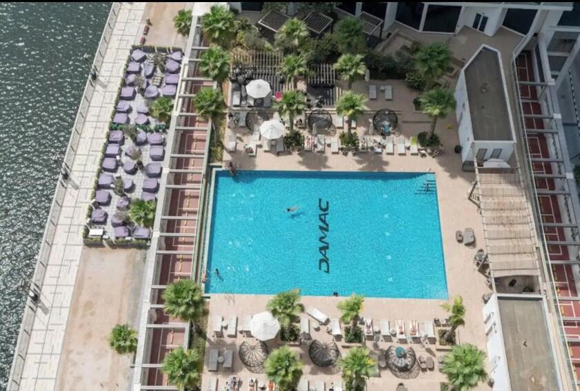Vogue Damac Maison Prive, Pool & Canal Views, Spacious Kitchen Prime Business Bay Location, Near Downtown, Burj Khalifa & The Mall Apartment