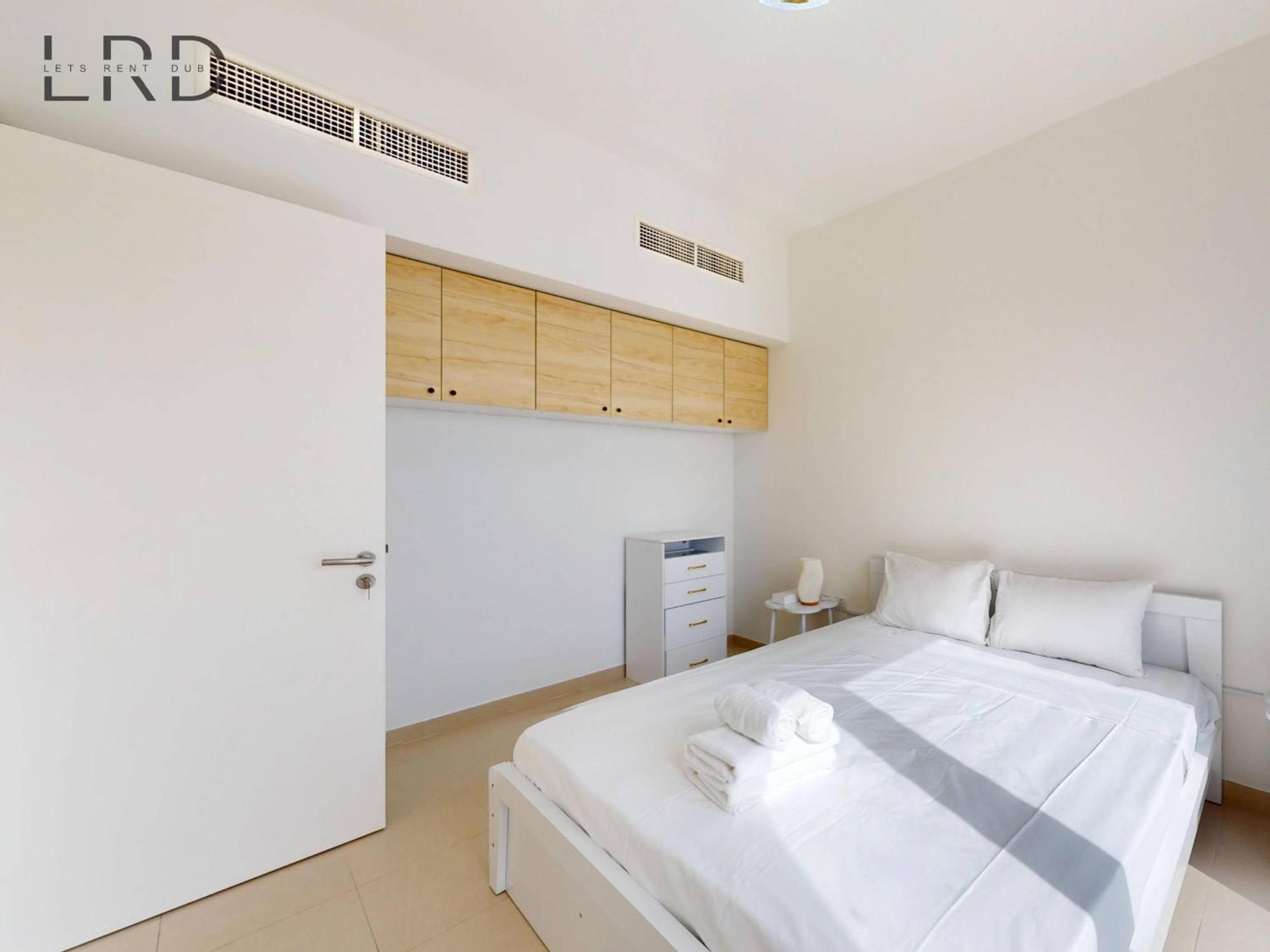 Bright And Cozy 2br In Emaar South *