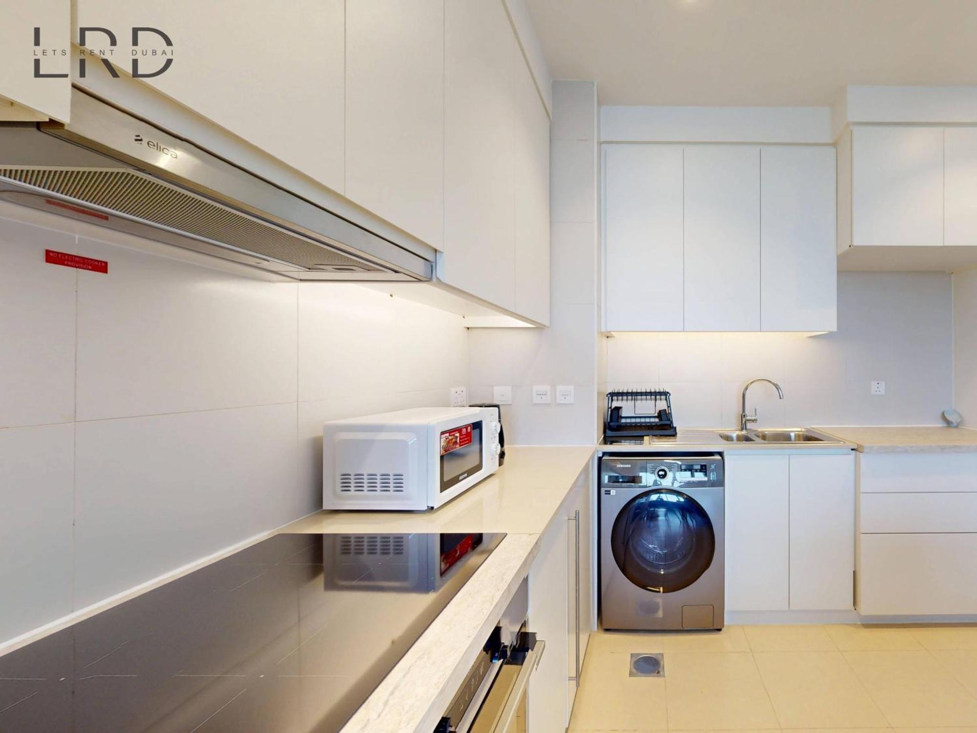 Bright And Cozy 2br In Emaar South *