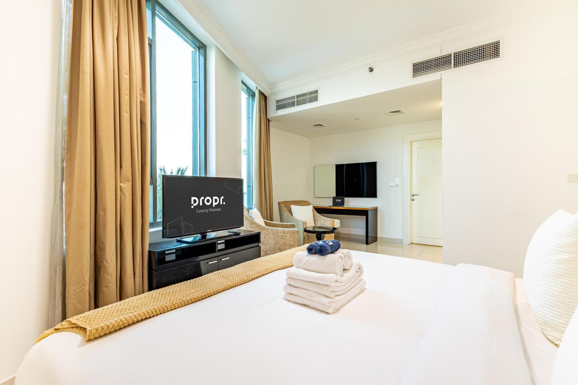 Spacious 1br - Balcony & Pool View - Capital Bay *