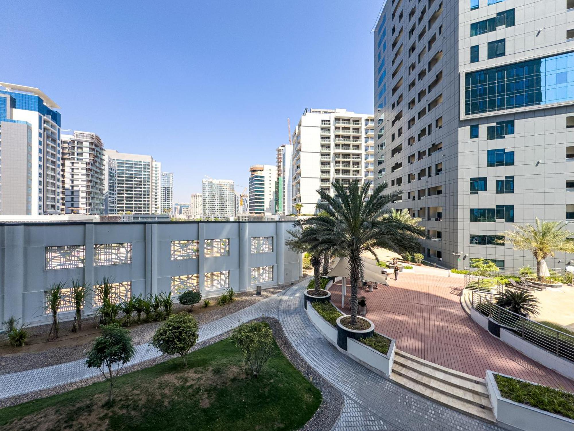 Spacious 1br - Balcony & Pool View - Capital Bay Apartment