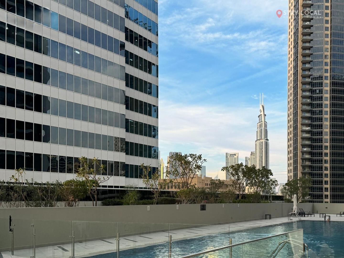 Apartment Downtown Dreams I Modern 2br Getaway I Iconic Full Burj Khalifa Views I Near Mall *