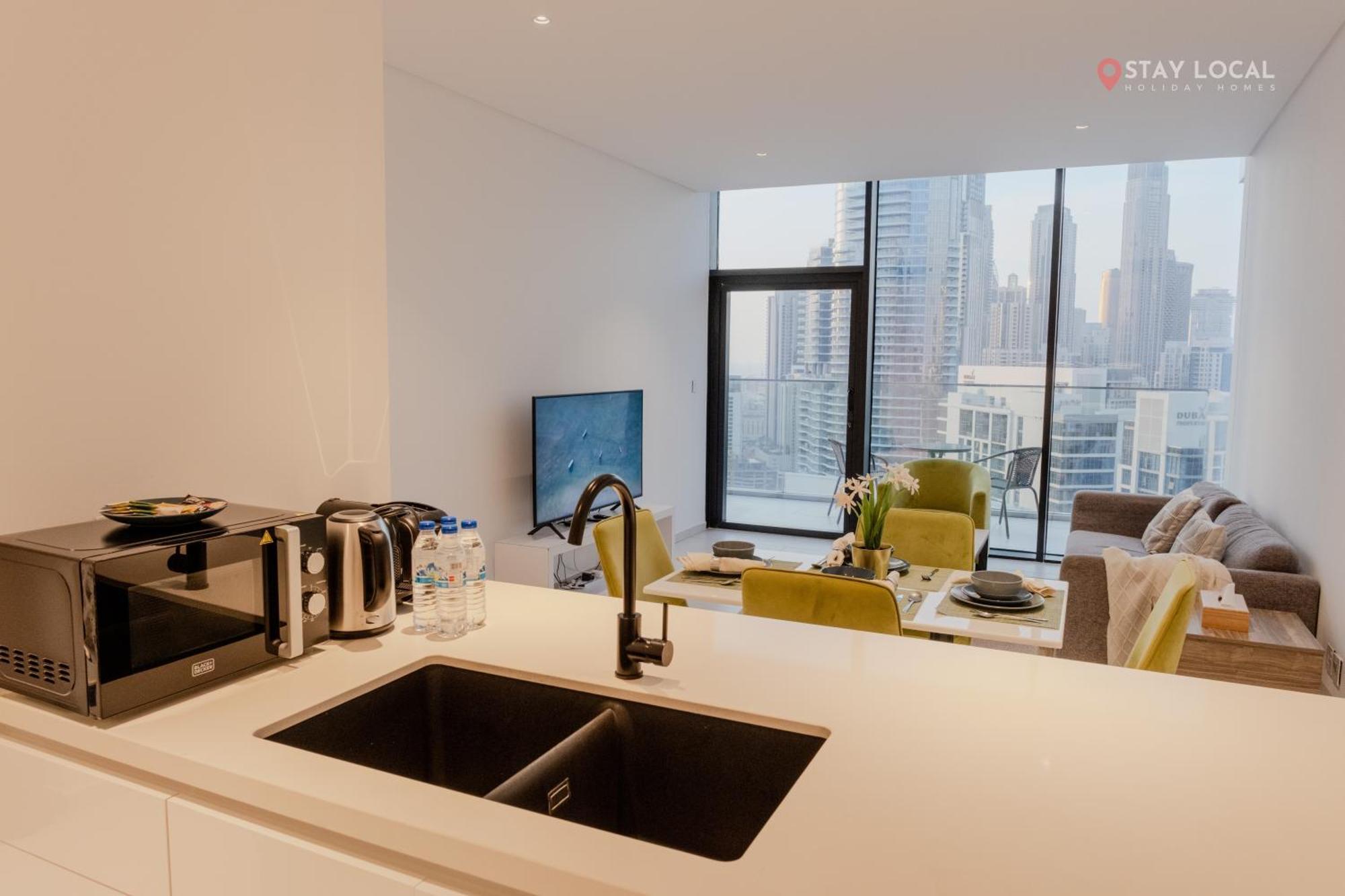 Downtown Dreams I Modern 2br Getaway I Iconic Full Burj Khalifa Views I Near Mall *