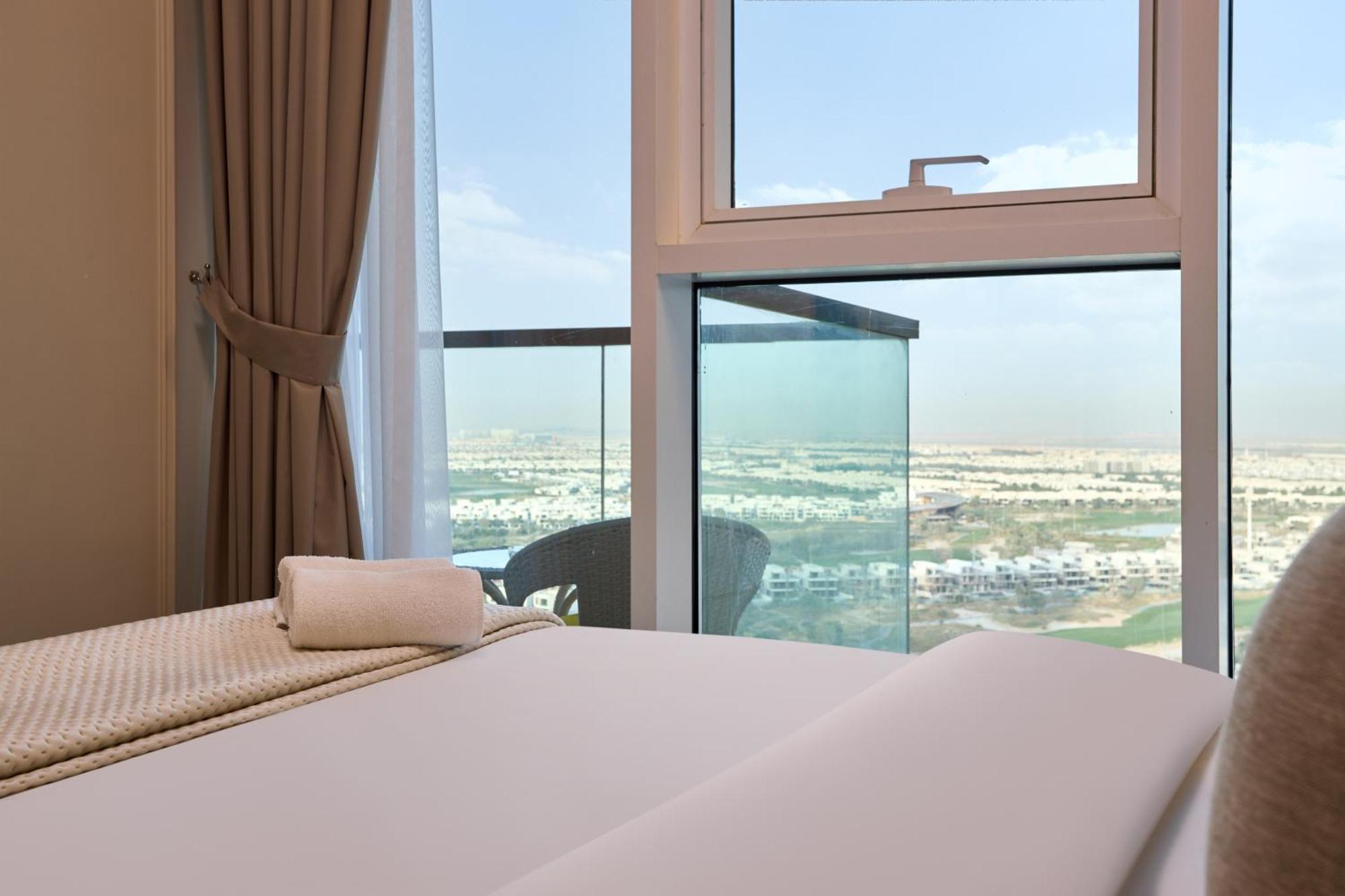 Apartment Modern High-floor 1br With Balcony, Pool Access & Golf Course View, Up To 4 Guests, By Stayfinity Dubai