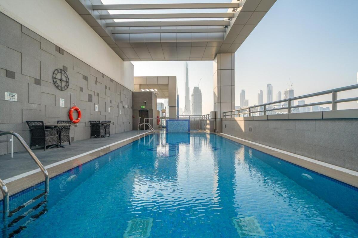 Modern 1br Canal & Burj View & Pool & Gym Access Apartment