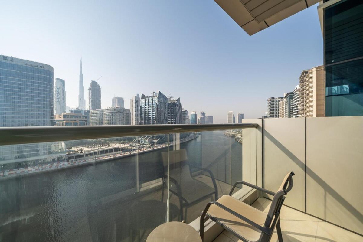 Modern 1br Canal & Burj View & Pool & Gym Access Apartment *