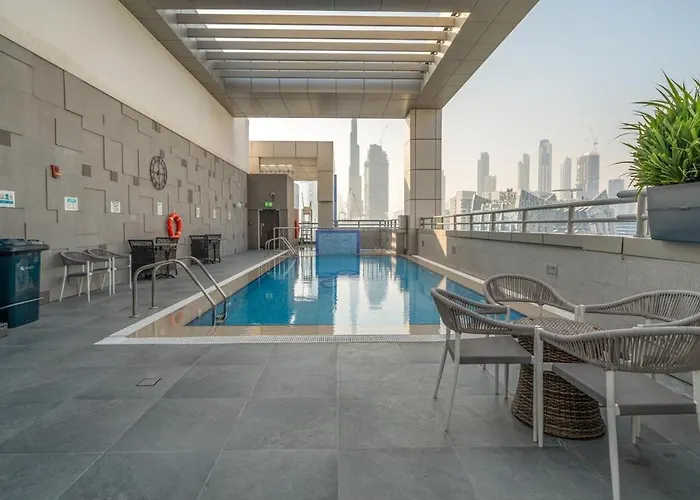 5 Star 2Br W & Infinity Pool Full Canal & Burj Views