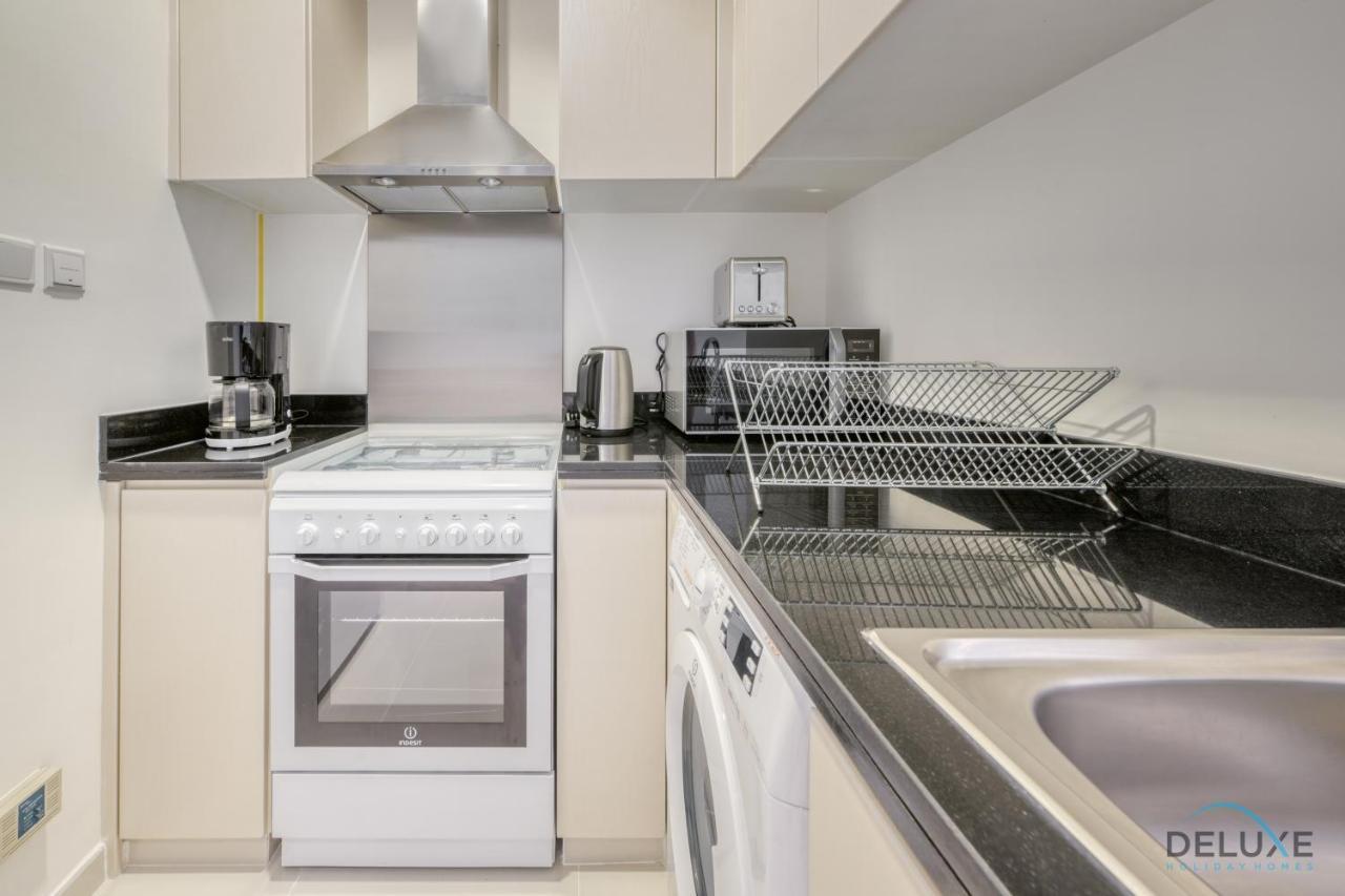 Prime 1br At Carson B Damac Hills Dubailand By Deluxe Homes Apartment *