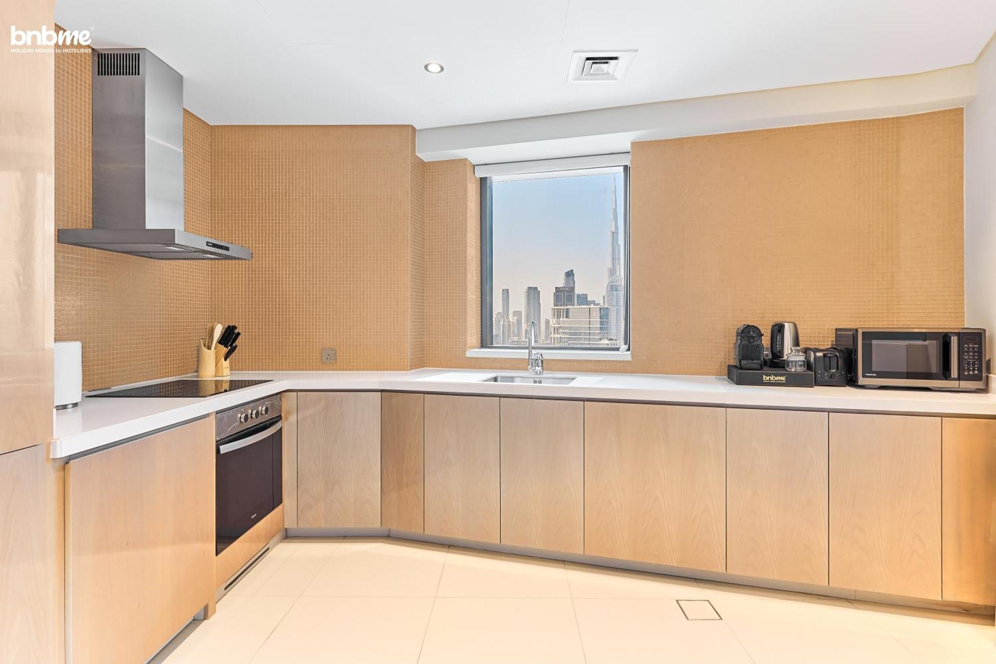 Bnbmehomes - Damac Towers Paramount Apartment *