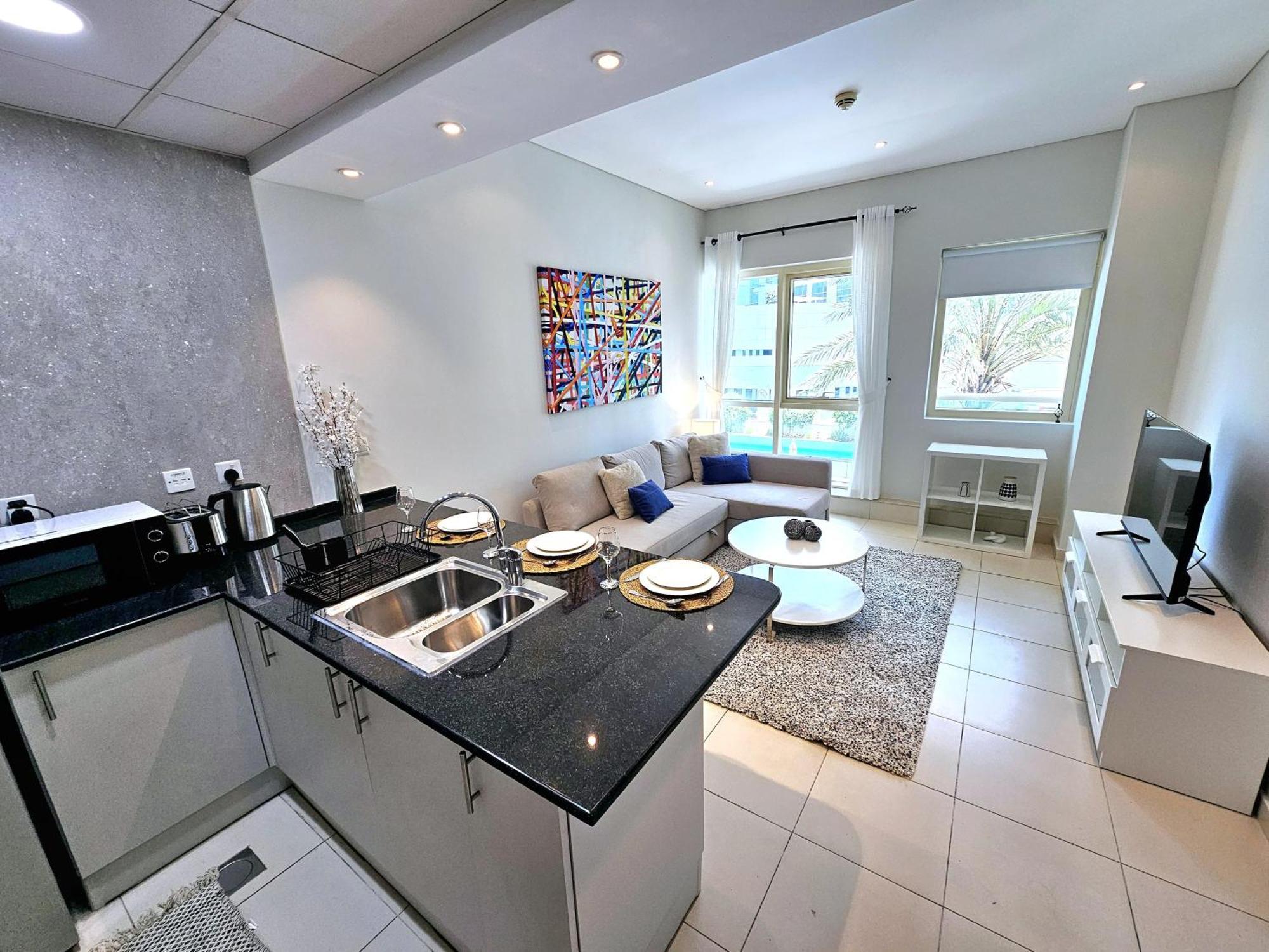 Apartment Sunrise Homes - Poolside 1 Bedroom Near Jbr Beach Dubai