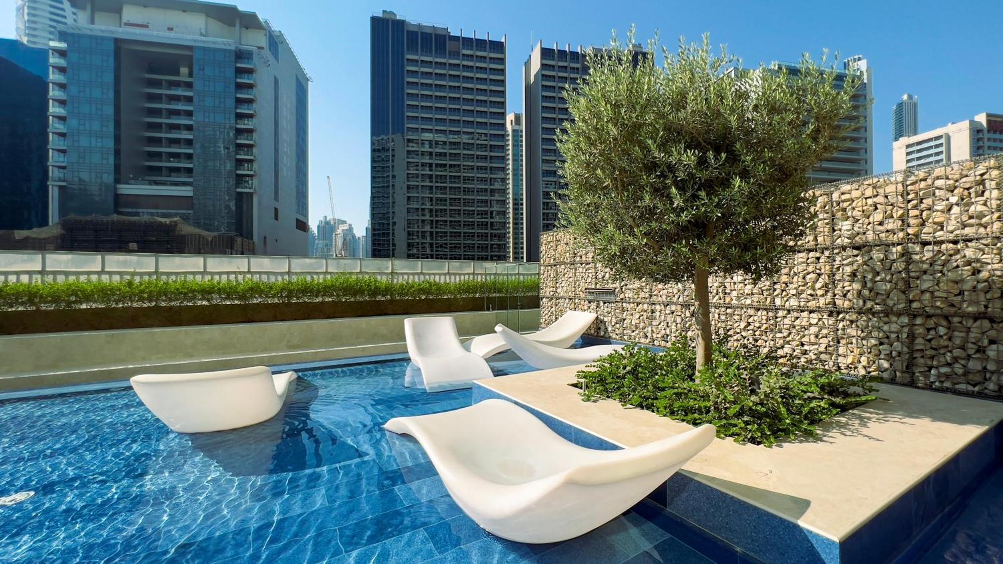 Keyrock Living - Chic Reva 1br With Pool Access Apartment Dubai