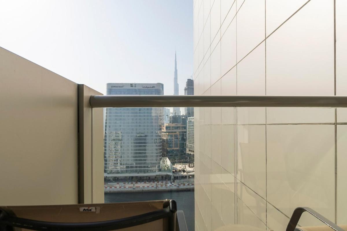 5 Star 2br W & Infinity Pool Full Canal & Burj Views Apartment Dubai