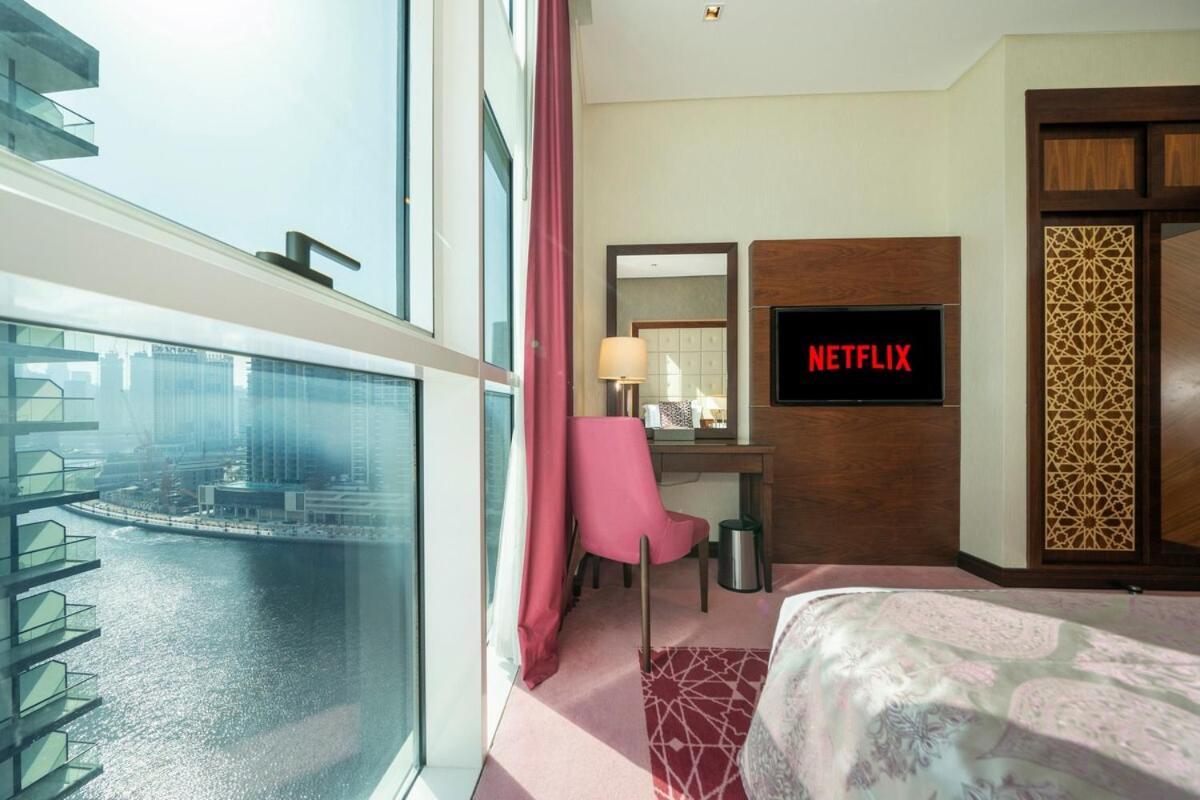 5 Star 2br W & Infinity Pool Full Canal & Burj Views Apartment Dubai