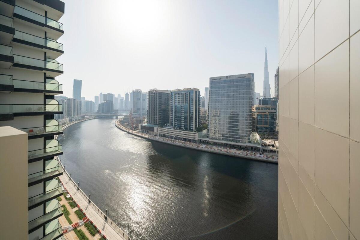 5 Star 2br W & Infinity Pool Full Canal & Burj Views *