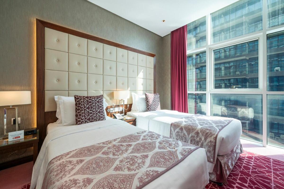 5 Star 2br W & Infinity Pool Full Canal & Burj Views Dubai