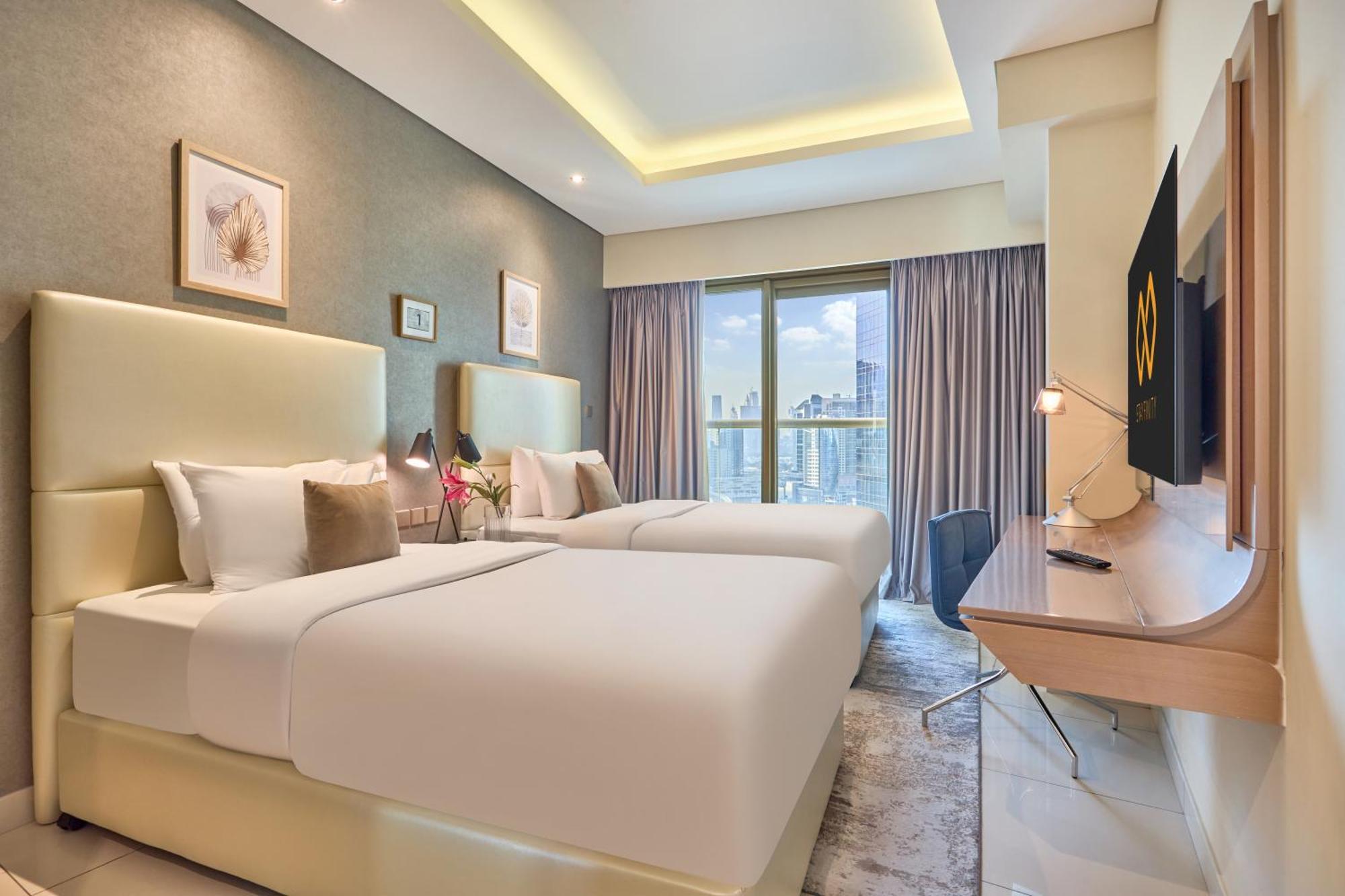 Apartment Spacious 2 Bedroom In Damac Towers By Paramount With Pool Gym Free Parking Sleeps 4 By Stayfinity *
